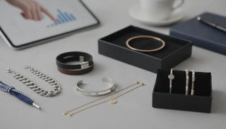 Assorted bracelets in chain, cuff, beaded, and bangle styles displayed together.
