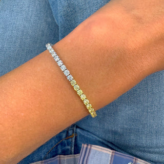 Alternating yellow & white diamond tennis bracelet 
