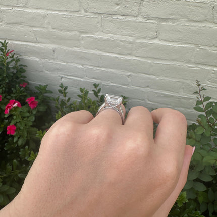 East/West Solitaire Emerald Cut Diamond With Hidden Diamond Halo Lifestyle 3