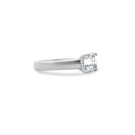 East/West Solitaire Emerald Cut Diamond With Hidden Diamond Halo Side