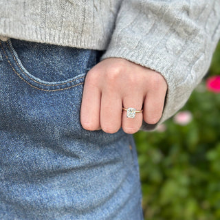 Elongated Solitaire Cushion Cut With Hidden Diamond Halo Lifestyle 1
