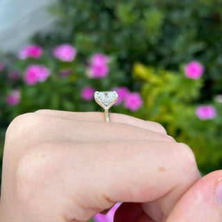 Elongated Solitaire Cushion Cut With Hidden Diamond Halo Lifestyle 2
