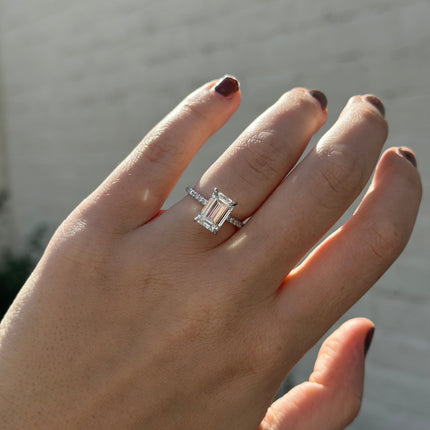 Emerald Cut Solitaire on Diamond Band Lifestyle 3