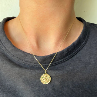 Emerald Trinity Knot Necklace Lifestyle

