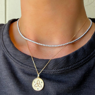 Emerald Trinity Knot Necklace Lifestyle
