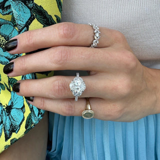 Oval Cut with Half Moon Cut Side Stones  Lindsey Leigh Jewelry.
