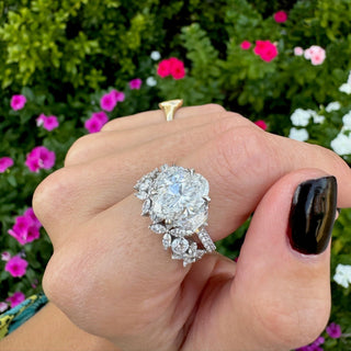 Oval Cut with Half Moon Cut Side Stones  Lindsey Leigh Jewelry.
