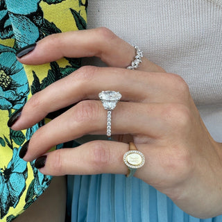Oval Cut with Half Moon Cut Side Stones  Lindsey Leigh Jewelry.
