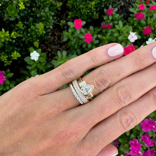 Bezel Set Pear with Straight Baguette Cut Side Stones  Lindsey Leigh Jewelry.
