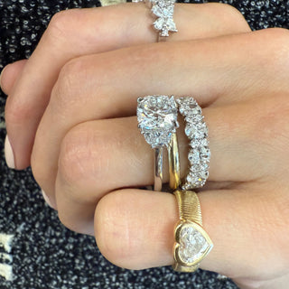 Cushion Cut with Half Moon Cut Side Stones
