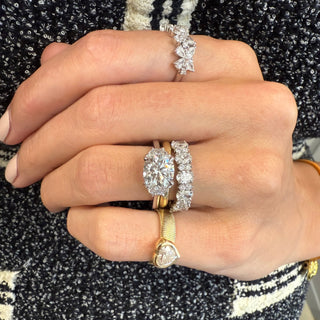 Cushion Cut with Half Moon Cut Side Stones
