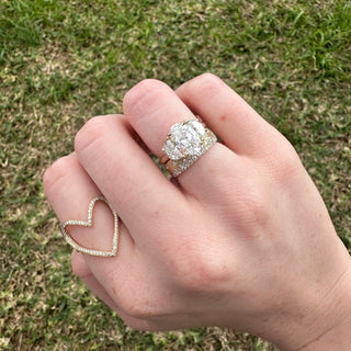 Oval Cut with Half Moon Cut Side Stones  Lindsey Leigh Jewelry.

