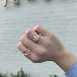 Oval Cut with Half Moon Cut Side Stones  Lindsey Leigh Jewelry.
