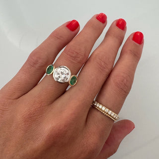 Lindsey Leigh Jewelry Round Bezel Diamond With Round Bezel Emerald Side Stones Lifestyle 2
