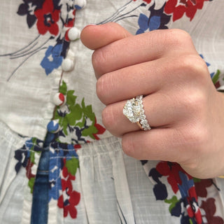 Oval Cut with Half Moon Cut Side Stones  Lindsey Leigh Jewelry.
