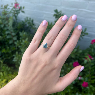 Solitaire Blue Diamond Pear With Hidden Diamond Halo Lifestyle 3
