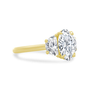 Oval Cut with Half Moon Cut Side Stones  Lindsey Leigh Jewelry.
