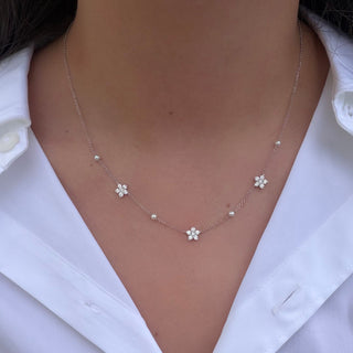 bloom and pearl white gold
