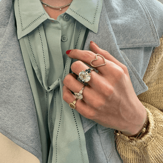 Oval Cut Aquamarine With Trio Gemstones  Lindsey Leigh Jewelry.
