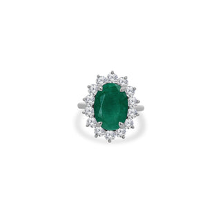 Oval Cut Emerald with Jumbo Round Diamond Halo  Lindsey Leigh Jewelry.
