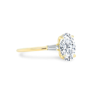Oval Cut with Tapered Baguette Cut Side Stones  Lindsey Leigh Jewelry.
