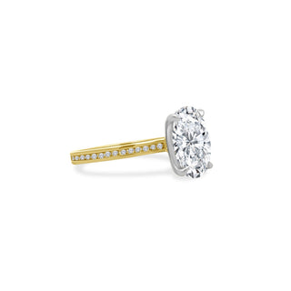 Oval Cut Solitaire on Channel Set Diamond Band  Lindsey Leigh Jewelry.
