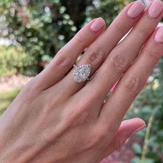 Pear Cut Solitaire with Halo  Lindsey Leigh Jewelry.
