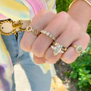 Pear Cut with Tapered Baguette Cut Side Stones  Lindsey Leigh Jewelry.

