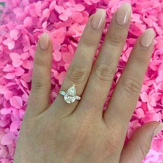 Pear Cut with Tapered Baguette Cut Side Stones  Lindsey Leigh Jewelry.
