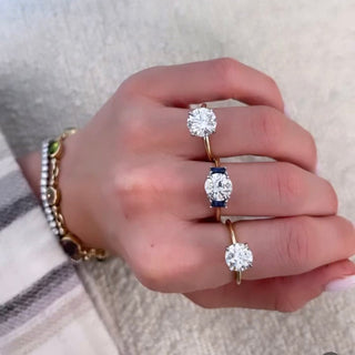 Round with Straight Baguette Cut Side Stones  Lindsey Leigh Jewelry.
