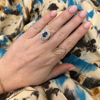 2.15ct Oval Cut Sapphire with Sunburst Halo  Lindsey Leigh Jewelry.
