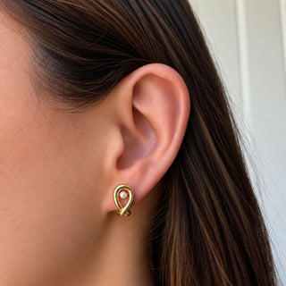 small pearl stud in earring jacket
