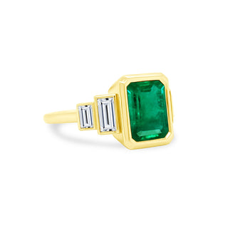 Bezel Set Emerald Cut Emerald with Double Baguette Cut Diamond Side Stones  Lindsey Leigh Jewelry.
