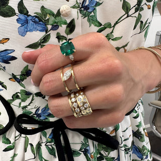 Cushion Cut Emerald with Pear Cut Diamond Side Stones  Lindsey Leigh Jewelry.
