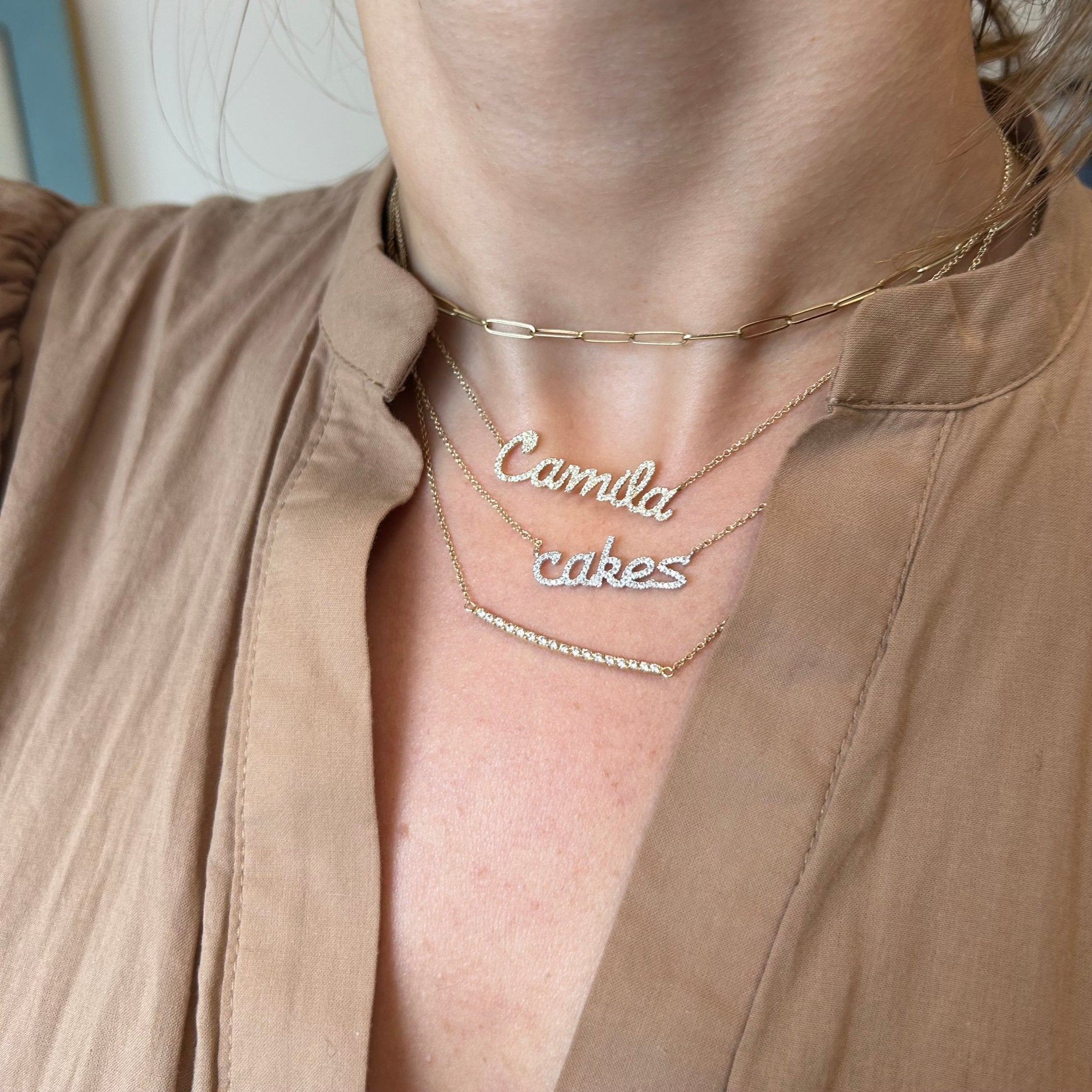 Why Do People Wear Necklaces with Their Own Name? – ROSOKI