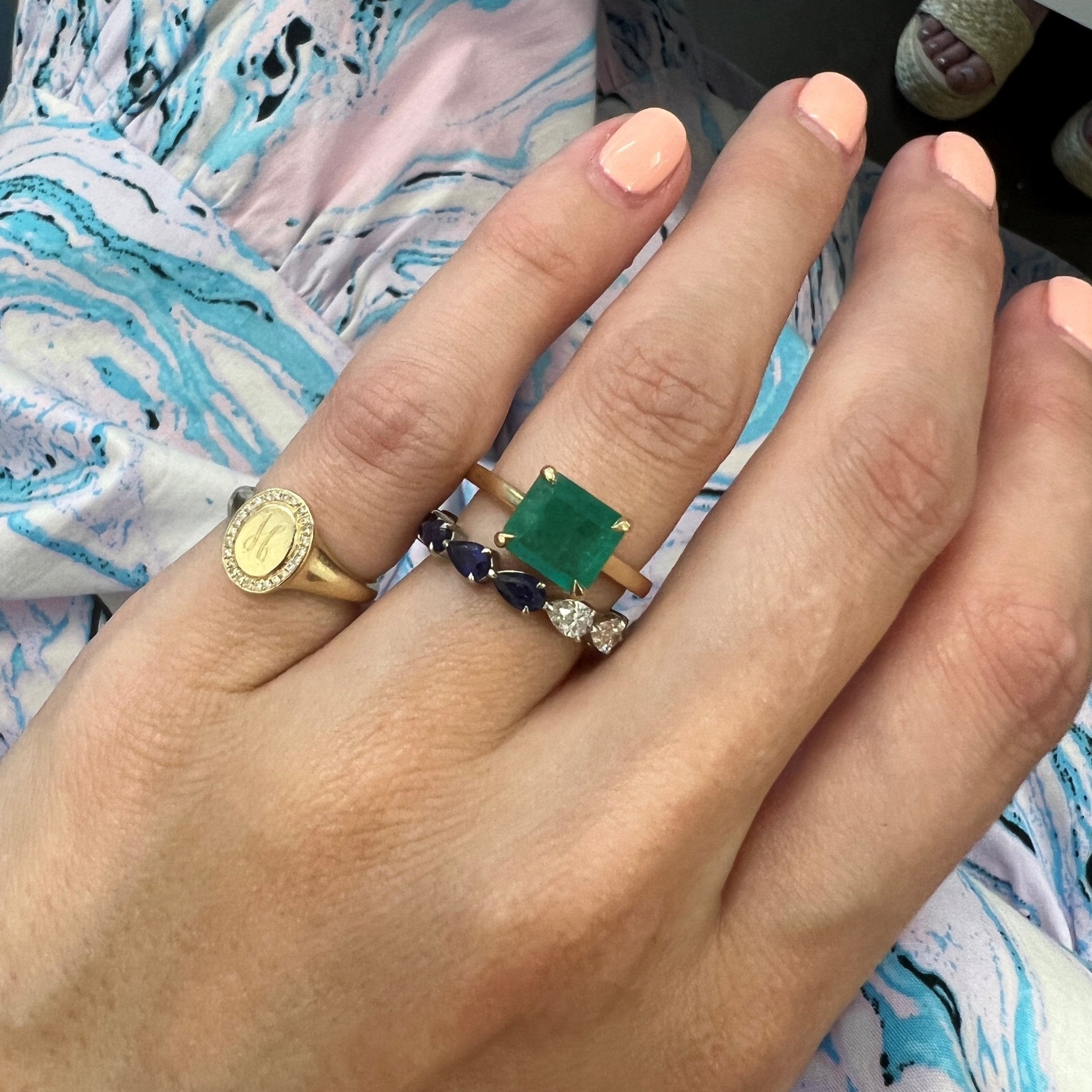 East west shop emerald ring