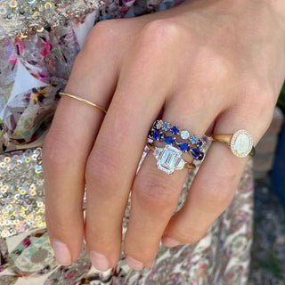 Emerald Cut with Trapezoid Cut Side Stones  Lindsey Leigh Jewelry.
