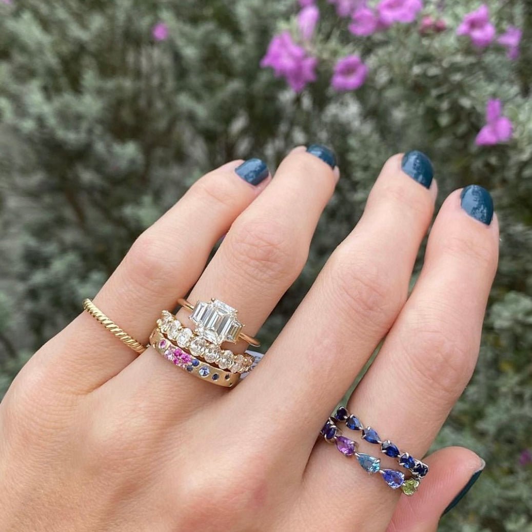 Emerald cut diamond ring with emerald side stones Clearance