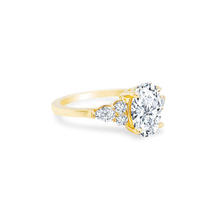 Oval Cut Diamond with Mixed Shape Trio Side Stones  Lindsey Leigh Jewelry.
