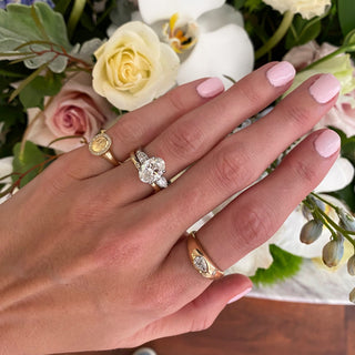 Oval Cut with Pear Cut Side Stones  Lindsey Leigh Jewelry.
