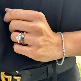 Round with Tapered Baguette Cut Side Stones  Lindsey Leigh Jewelry.
