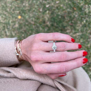 Round with Tapered Baguette Cut Side Stones  Lindsey Leigh Jewelry.
