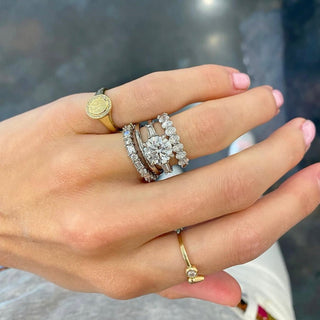 Round with Tapered Baguette Cut Side Stones  Lindsey Leigh Jewelry.
