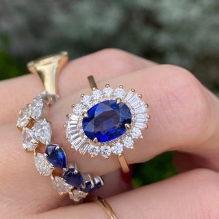 Oval Cut Sapphire with Sunburst Halo  Lindsey Leigh Jewelry.
