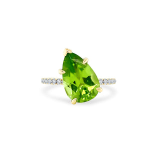Offset Pear Cut Peridot Solitaire on Diamond Band  Lindsey Leigh Jewelry.

